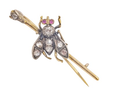 Lot A Victorian gold fly pin brooch, set with old-cut and rose-cut diamonds, and ruby cabochon eyes.