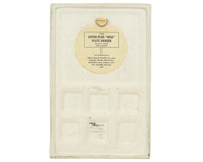 Lot 375 - A Troika calculator plaque, by Sylvia Vallance.