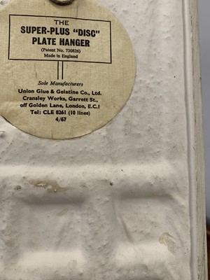 Lot 375 - A Troika calculator plaque, by Sylvia Vallance.