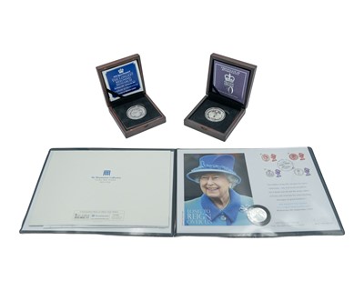 Lot 18 - GB - Two .925 silver proof QEII Royal Commemorative proof £5 coins, & a £20 silver proof coin cover.