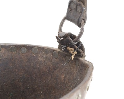 Lot 45 - A 19th century leather fire bucket with studded copper rim.