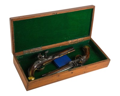 Lot 127 - An interesting pair of Italian walnut flintlock pistols.