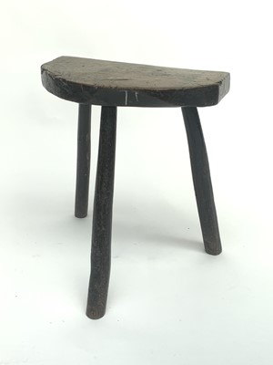 Lot 3039 - A 19th century country made elm stool, with...