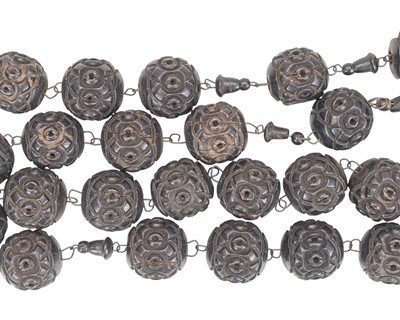 Lot 32 - A set of carved and stained wood rosary beads.