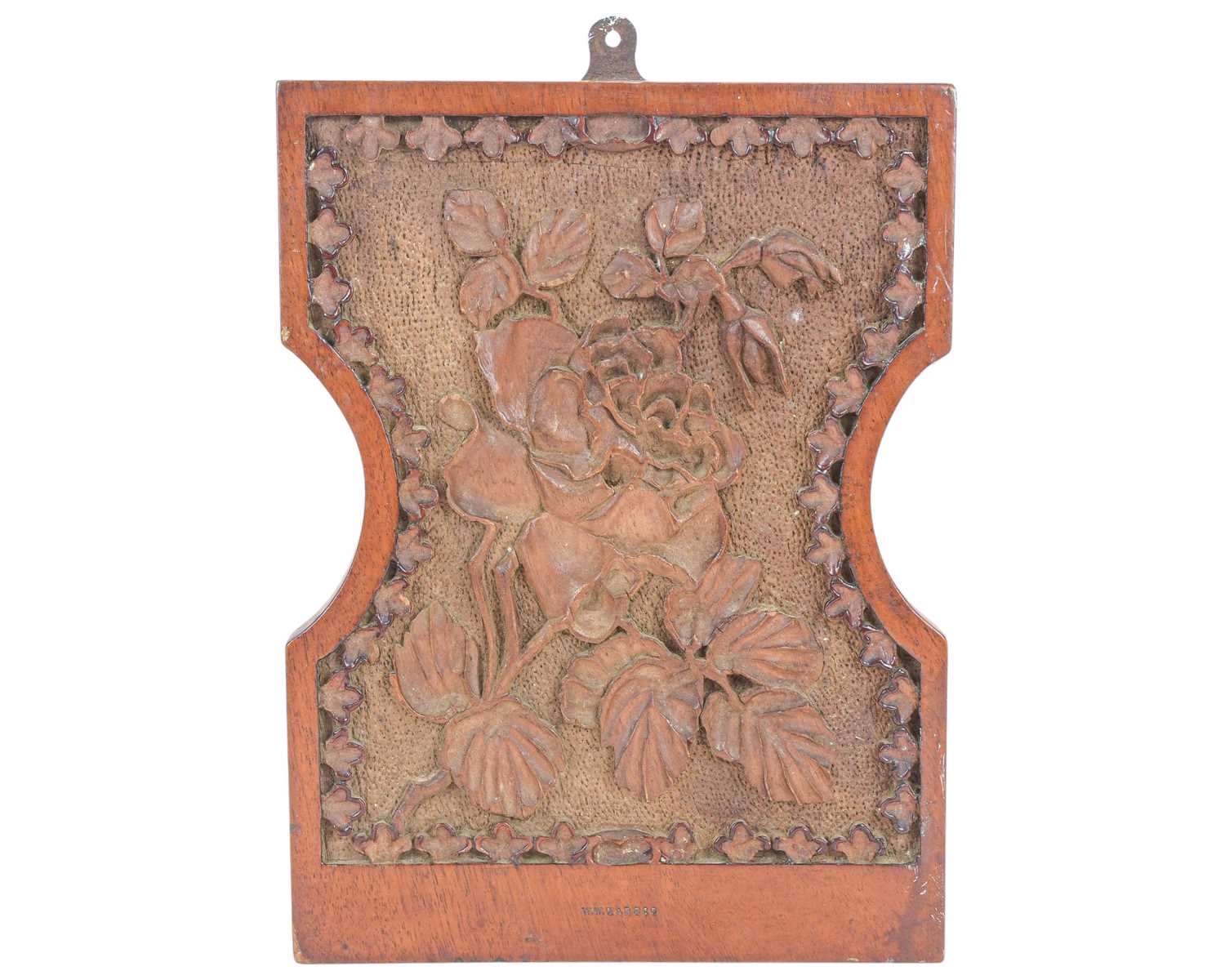 Lot 10 - A shaped mahogany plaque.