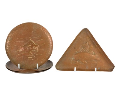 Lot 159 - Three similar Newlyn copper small circular dishes.