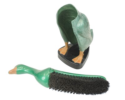 Lot 19 - Four mid-century early plastic 'Dandy Duck' novelty clothes brushes with stands.