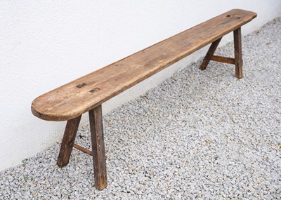 Lot 827 - A pair of rustic pine benches.