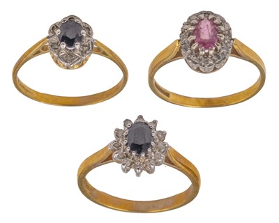 Lot 32 - A selection of three 9k hallmarked gold sapphire and diamond set cluster rings.