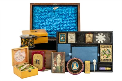 Lot 618 - Sewing Accessories. A Victorian blue silk lined work box and contents.