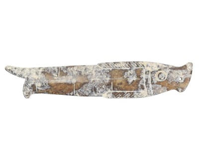 Lot 535 - A Chinese archaic calcified jade type pendant.
