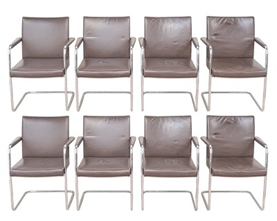 Lot 140 - A set of eight leather and chrome cantilever armchairs.