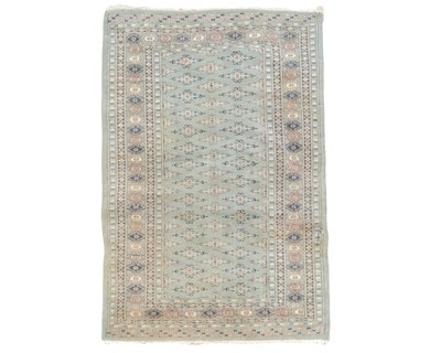 Lot 561 - A hand knotted Pakistan Bokhara rug.