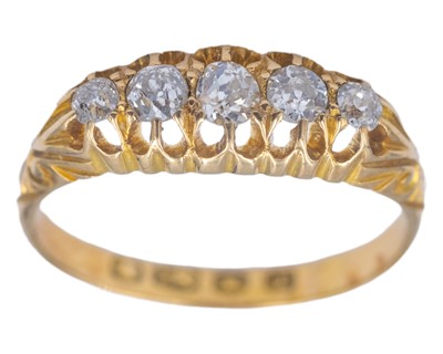 Lot 8 - A Victorian 18k old mine-cut diamond set five-stone ring.