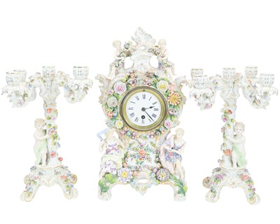 Lot 678 - A 'Dresden' porcelain clock set, probably Volkstedt.