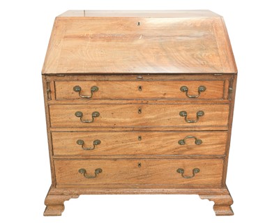 Lot 930 - A George III mahogany bureau.