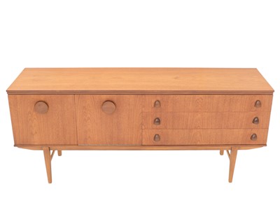 Lot 230 - A teak sideboard.