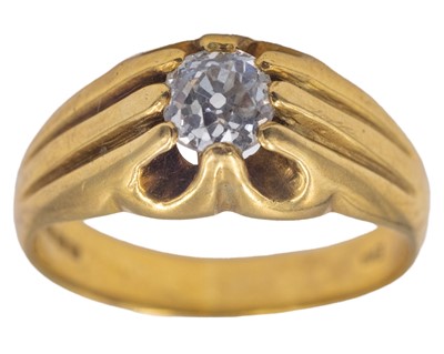 Lot 12 - A heavy 18k hallmarked gold gentleman's ring, set with an old mine-cut diamond.