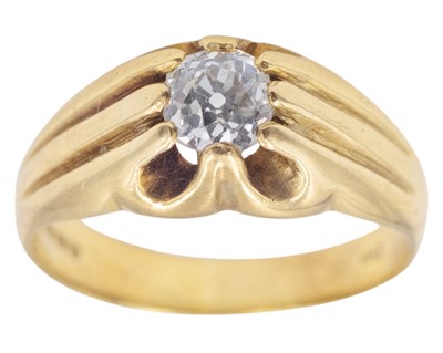 Lot 12 - A heavy 18k hallmarked gold gentleman's ring, set with an old mine-cut diamond.