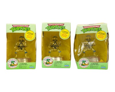 Lot 232 - Three Teenage Mutant Ninja Turtles, boxed.