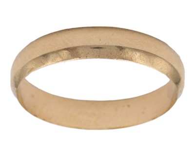 Lot 236 - A 9k yellow gold wedding band.