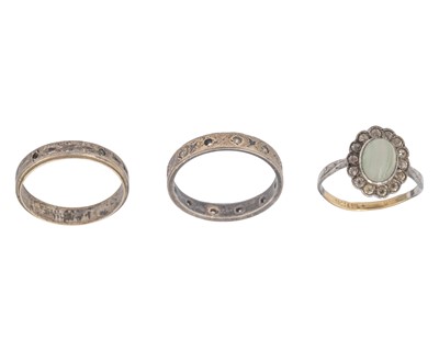 Lot 225 - Three gold and silver rings.