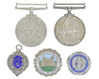 Lot 144 - Medals, nursing badges and silver fob.