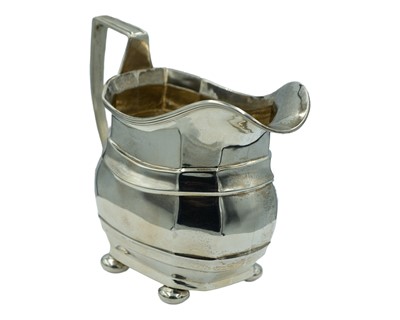Lot 83 - A George V silver milk jug by George Nathan & Ridley Hayes.