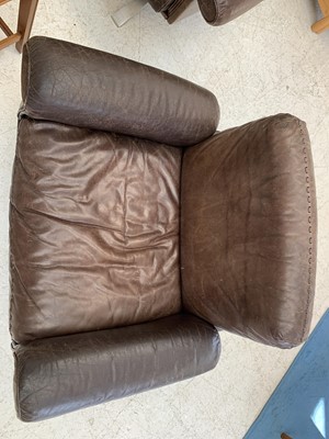 Lot 254 - A brown leather De Sede DS-31 sofa and two swivel chairs.