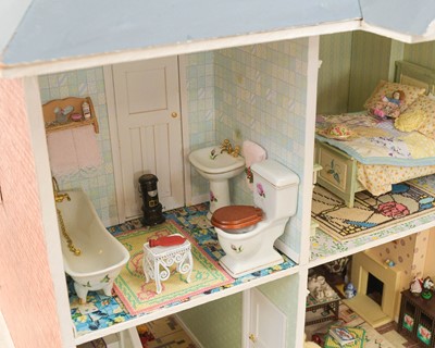 Lot 49 - A 1930s style, two storey dolls house.