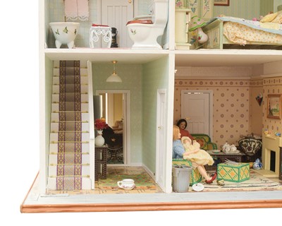 Lot 49 - A 1930s style, two storey dolls house.