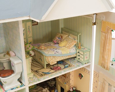 Lot 49 - A 1930s style, two storey dolls house.