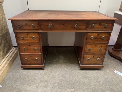 Lot 3194 - An Edwardian walnut twin pedestal writing desk,...