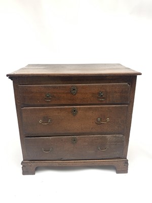 Lot 3053 - A George III oak country made chest of three...