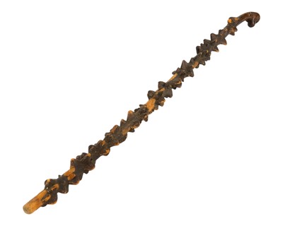 Lot 112 - An African carved knobbly wood walking stick.
