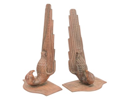 Lot 95 - A pair of carved wood wall sconces in the form of parrots.