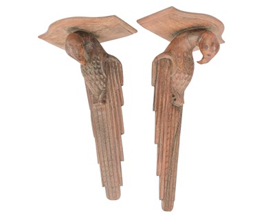 Lot 95 - A pair of carved wood wall sconces in the form of parrots.
