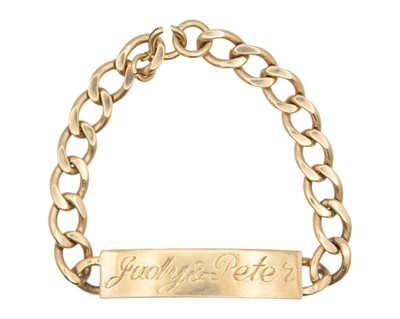 Lot 17 - A heavy 9k hallmarked gold curb-link id bracelet.