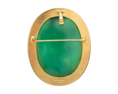 Lot An 18k Italian chrysoprase cameo oval brooch and pair of earrings suite.