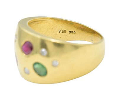 Lot 66 - A modern high-purity gold etoile set diamond, emerald and ruby set band ring and earring suite.