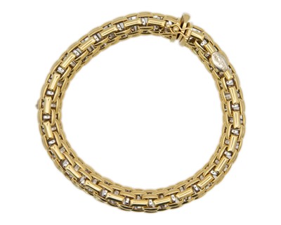 Lot FOPE - An Italian 18k bi-colour gold articulated brick-link bracelet.