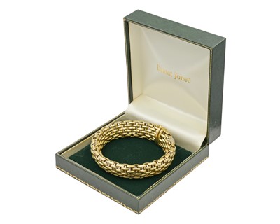 Lot 108 - FOPE - An Italian 18k bi-colour gold articulated brick-link bracelet.