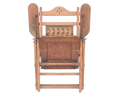Lot 912 - A stylish Victorian inlaid oak folding occasional chair.