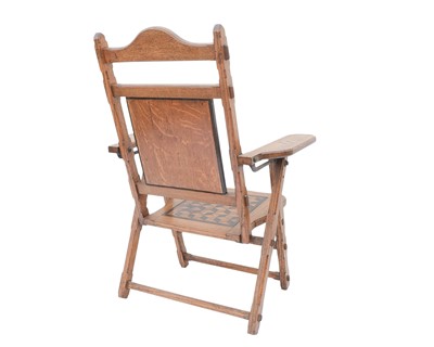 Lot 912 - A stylish Victorian inlaid oak folding occasional chair.