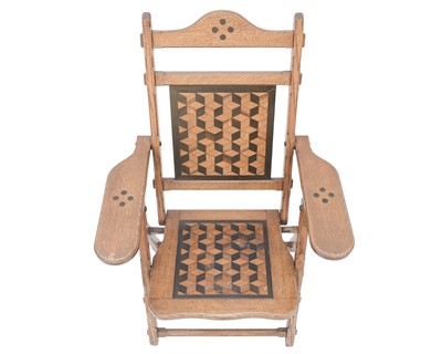 Lot 912 - A stylish Victorian inlaid oak folding occasional chair.