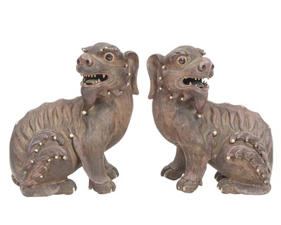 Lot 505 - A pair of Chinese Shiwan pottery Dogs of Fo.