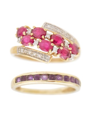 Lot 43 - A 9k yellow gold ring set with rubies and diamonds.