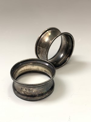 Lot 17 - A filled silver capstan inkwell two silver...