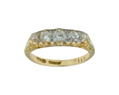 Lot 74 - An Edwardian old-cut graduated diamond five-stone ring.