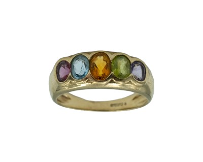 Lot 61 - A 9k yellow gold gemset 'rainbow' ring.